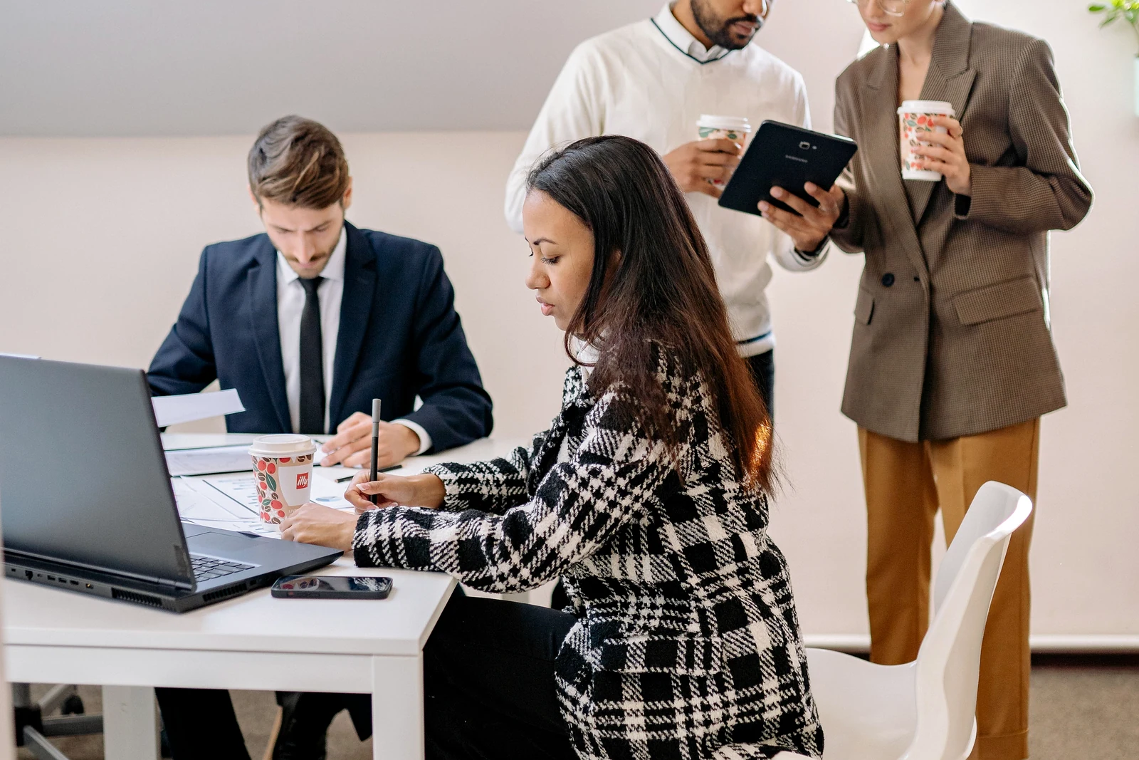 Mortgage professionals collaborating around a client file